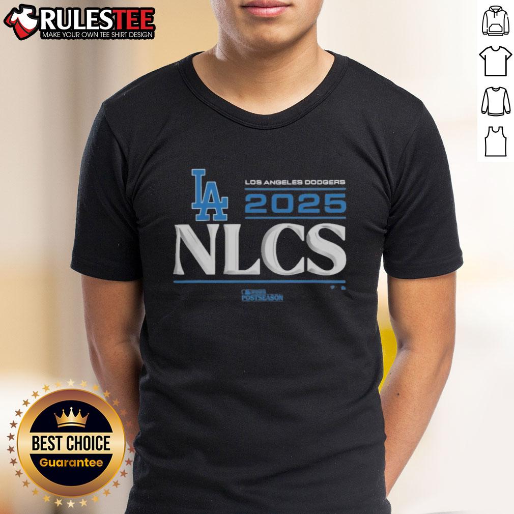 official-los-angeles-dodgers-2025-division-series-winner-locker-room-t-shirt Alt Text: Official Los Angeles Dodgers 2025 Division Series Winner Locker Room T-Shirt displayed on a hanger, featuring team logo and colors.