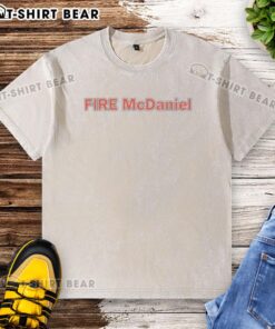 Official Miami Dolphins Fire Mike McDaniel washed t-shirt featuring team colors and logo, perfect for fans.
