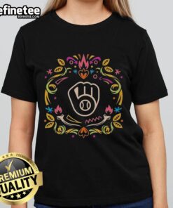 Official Milwaukee Brewers Dia de los Muertos MLB celebration ladies tee featuring vibrant skull design and team logo.