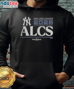 Official New York Yankees 2025 Division Series Winner hoodie displayed in a locker room, showcasing team pride and style.