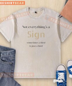 Official 'Not Everything's a Sign, Sometimes a Bird is Just a Bird' washed t-shirt showcasing a casual, trendy design.