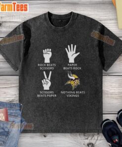 Alt Text: Official Minnesota Vikings football logo on a washed t-shirt, perfect for fans showcasing team spirit.