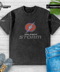 Alt Text: Official Orlando Storm football logo on a washed t-shirt, perfect for fans and casual wear enthusiasts.