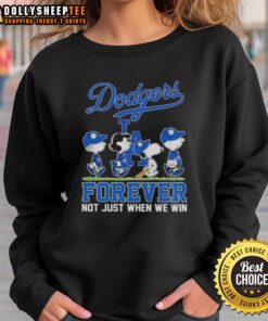 Official Peanuts Snoopy and Friends X Los Angeles Dodgers sweatshirt, featuring a fun design celebrating fandom.