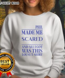 Funny sweatshirt reading 'Official Phil Made Me Gay' showcasing humor and pride in LGBTQ+ identity.