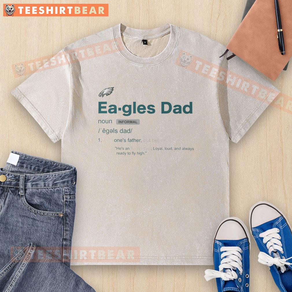 Official Philadelphia Eagles Dad Definition Washed T Shirt Alt Text: Official Philadelphia Eagles Dad Definition Washed T-Shirt featuring a fun graphic definition for proud dads.