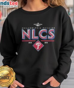 Alt Text: Official Philadelphia Phillies 2025 NLCS Division Series Winner Postseason sweatshirt in red with team logo.