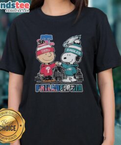 Official Philadelphia Phillies and Eagles 75th Anniversary Peanuts Snoopy Ladies Tee featuring vibrant team graphics.