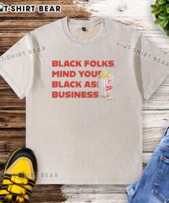 Alt Text: Official Popcorn Black Folks 'Mind Your Black Ass Business' washed t-shirt showcasing bold graphic design.