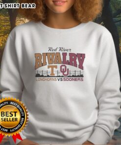 Official Red River Texas Longhorns and Oklahoma Sooners sweatshirt featuring team logos and vibrant colors for fans.
