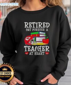Alt Text: Official Retired But Forever A Teacher At Heart Kansas City Chiefs Football Sweatshirt in red with logo design.
