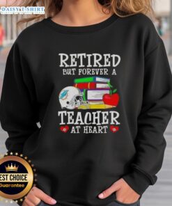 Alt Text: Official Retired But Forever A Teacher At Heart Miami Dolphins Football Sweatshirt in vibrant team colors.