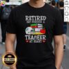 Official Retired But Forever A Teacher At Heart Miami Dolphins Football T-Shirt featuring team colors and logo.