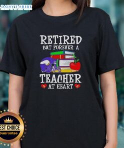 Alt Text: Minnesota Vikings football ladies tee with 'Retired But Forever A Teacher At Heart' design, perfect for fans.
