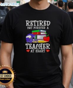 Official Retired But Forever A Teacher At Heart Minnesota Vikings Football T-Shirt featuring team colors and logo.