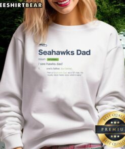Alt Text: Official Seattle Seahawks Dad Definition Sweatshirt featuring bold graphics and soft fabric, perfect for fans.