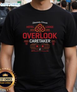 Alt Text: Official Shining Hotel Lodge T-Shirt, Estd 1909, featuring Overlook Caretaker design, perfect for fans of the classic film.