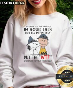 Alt Text: Official Snoopy and Charlie Brown 'I May Not Put Sparkle In Your Eyes' WTF sweatshirt featuring playful cartoon design.