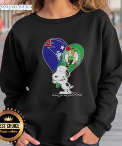 Official Snoopy Hug Heart Sweatshirt featuring New England Patriots and Boston Celtics logo, perfect for sports fans.