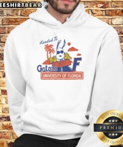 Alt Text: Official Snoopy X Florida Gators hoodie featuring iconic character and vibrant team colors for University of Florida fans.