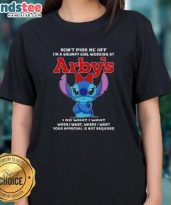 Grumpy girl in an Arbys ladies tee with 'Don't Piss Me Off' slogan, showcasing official Stitch design.