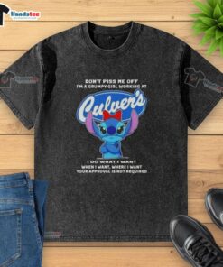Alt Text: Grumpy girl wearing a washed 'Don't Piss Me Off, I'm a Grumpy Girl' Culver's t-shirt, showcasing her playful attitude.