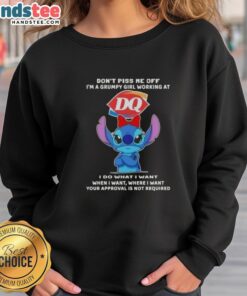 Alt Text: Grumpy girl in a sweatshirt with 'Don't Piss Me Off' slogan, working at Dairy Queen, showcasing official Stitch design.