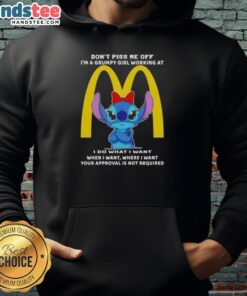 Alt Text: Grumpy girl in a hoodie with Don't Piss Me Off graphic, working at McDonald's, showcasing official Stitch design.