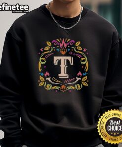 Official Texas Rangers Dia de los Muertos MLB celebration sweatshirt featuring vibrant colors and festive design.