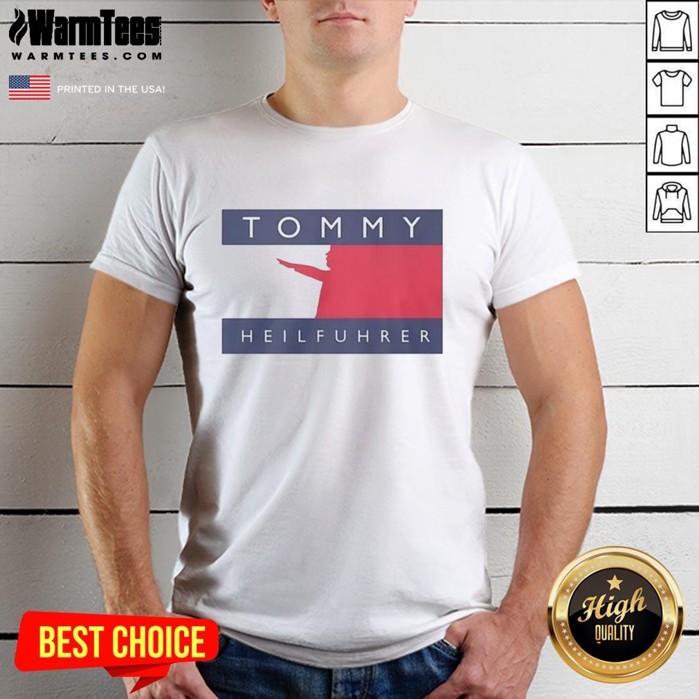 official-tommy-heilfuhrer-logo-parody-t-shirt Alt Text: Official Tommy Heilfuhrer logo parody T-shirt featuring a humorous design with bold graphics and vibrant colors.