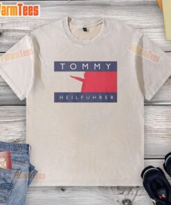 Alt Text: Official Tommy Heilfuhrer logo parody on a washed t-shirt, featuring bold graphics and a casual style.
