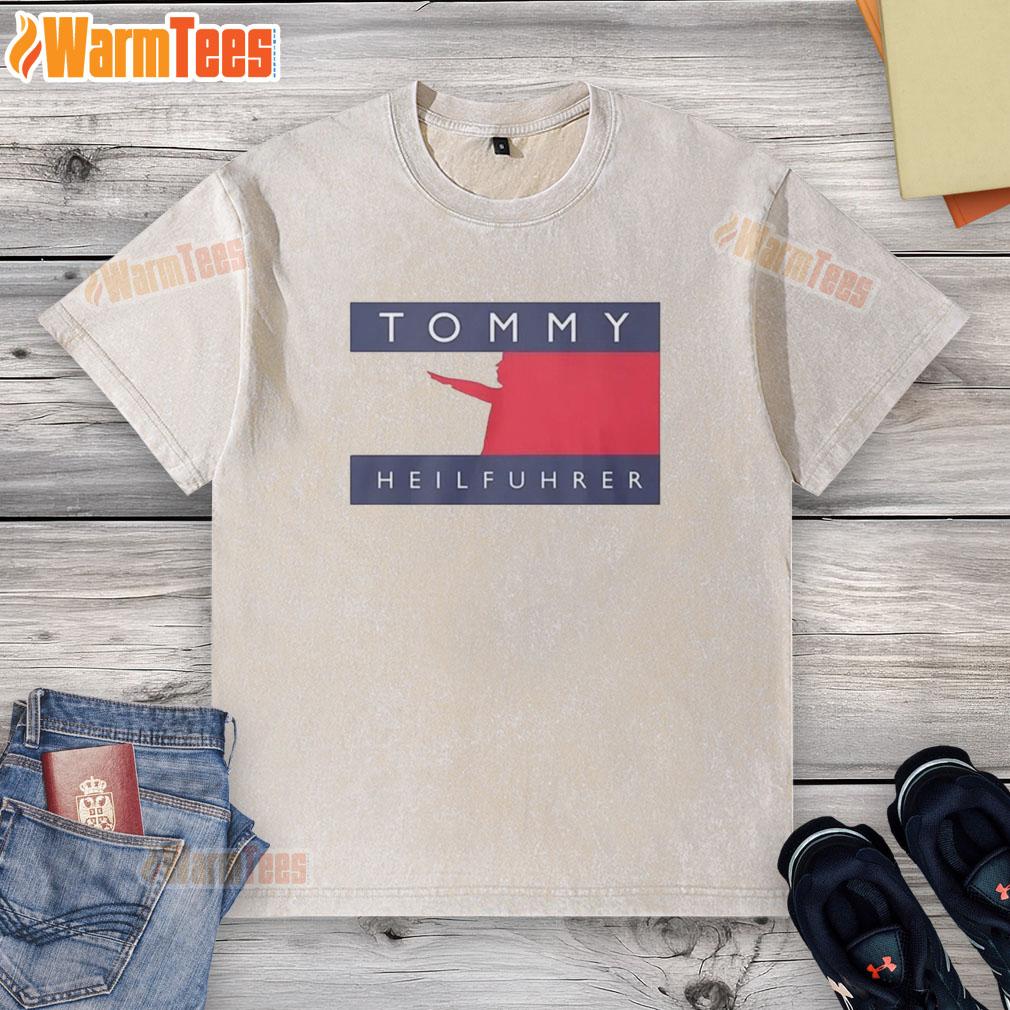 official-tommy-heilfuhrer-logo-parody-washed-t-shirt Alt Text: Official Tommy Heilfuhrer logo parody on a washed t-shirt, featuring bold graphics and a casual style.