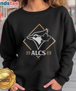 Alt Text: Official Toronto Blue Jays ALCS 2025 sweatshirt featuring team logo, perfect for fans and game day spirit.