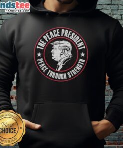 Alt Text: Official Trump The Peace President hoodie featuring 'Peace Through Strength' slogan in bold design.