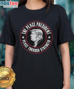 Official Trump The Peace President Ladies Tee featuring 'Peace Through Strength' slogan in stylish design.