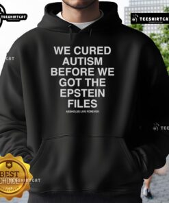 Official We Cured Autism Before We Got The Epstein Files Hoodie showcasing unique design and bold statement.