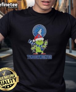 Original 2025 Minnesota Timberwolves Christmas Grinch Santa Hat Holiday T-Shirt design featuring festive graphics.
