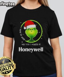 Funny Grinch Christmas tee for ladies with 'I used to smile, then I worked at Honeywell' text design.