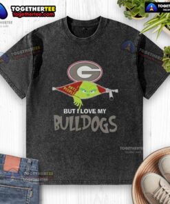 Alt Text: Original Grinch Christmas t-shirt featuring Georgia Bulldogs design, perfect for holiday fans and sports enthusiasts.
