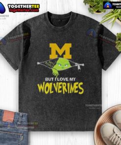 Original Grinch Christmas design on a Michigan Wolverines washed t-shirt, perfect for festive sports fans.