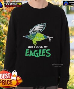 Alt Text: Cozy Original Grinch Christmas sweatshirt featuring love for Philadelphia Eagles in festive colors and design.