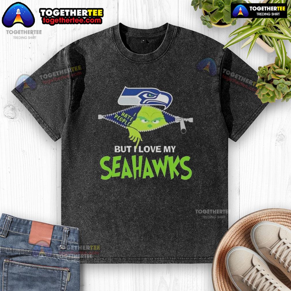 Original Grinch Christmas But I Love My Seattle Seahawks Washed T Shirt Alt Text: Original Grinch Christmas design on a washed t-shirt featuring Seahawks colors, perfect for Seattle Seahawks fans.
