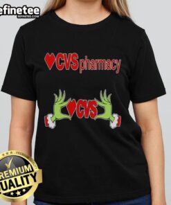 Original Grinch hands holding a heart on a CVS Pharmacy Christmas ladies tee, perfect for festive holiday spirit.