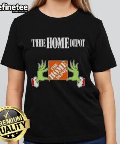 Alt Text: Original Grinch Hands Love The Home Depot Christmas Ladies Tee featuring festive design and vibrant colors.