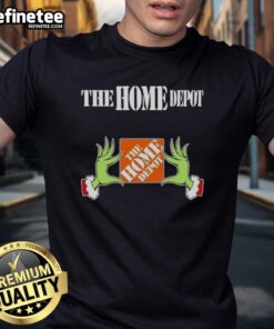 Original Grinch Hands Love The Home Depot Christmas T-Shirt featured in festive green with holiday graphics.