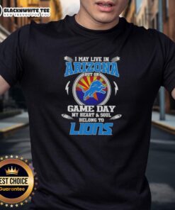 Alt Text: Detroit Lions T-shirt featuring 'I May Live In Arizona But On Game Day My Heart And Soul Belongs To Detroit Lions'