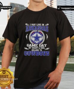 Alt Text: I May Live In Arkansas But On Game Day My Heart And Soul Belongs To Dallas Cowboys T-Shirt design featuring team colors.