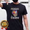 Alt Text: Original I May Live In Colorado But I'M A Minnesota Vikings Fan Forever T-Shirt showcasing team spirit and pride.