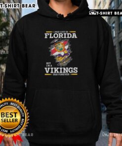Original I May Live In Florida But I'm A Minnesota Vikings Fan Forever Hoodie featuring vibrant team colors and logo.