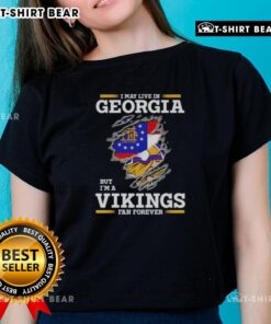 Original I May Live in Georgia But I'm A Minnesota Vikings Fan Forever Ladies Tee in vibrant colors, perfect for fans.